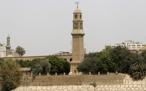 The clock tower of Qushla is seen at noon in central Baghdad